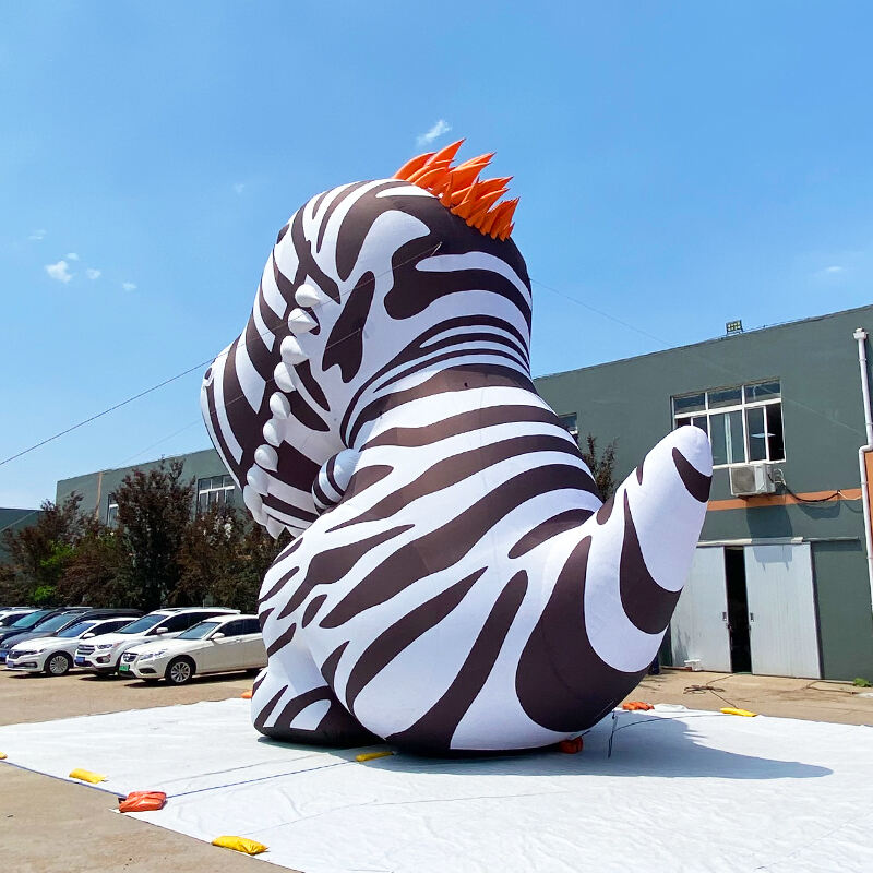 Inflatable striped dinosaur