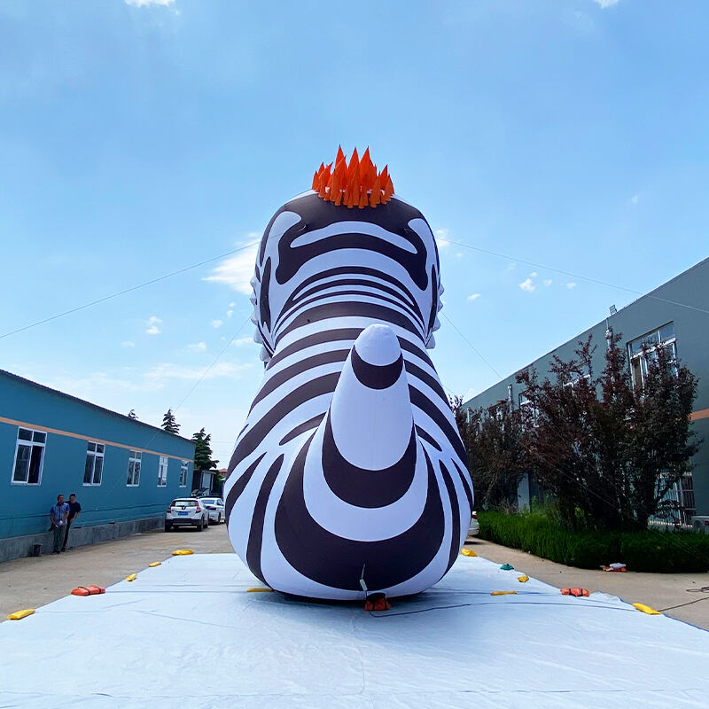 Inflatable striped dinosaur