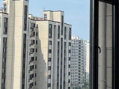 What are the advantages of built-in blinds over regular screen windows?