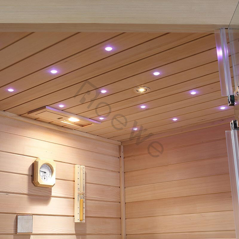 Sala de sauna de madera Roewebath con techo de luces LED de colores