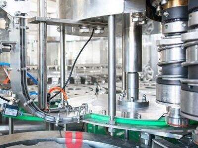 Preventing breakage on a high speed glass bottle filling machine