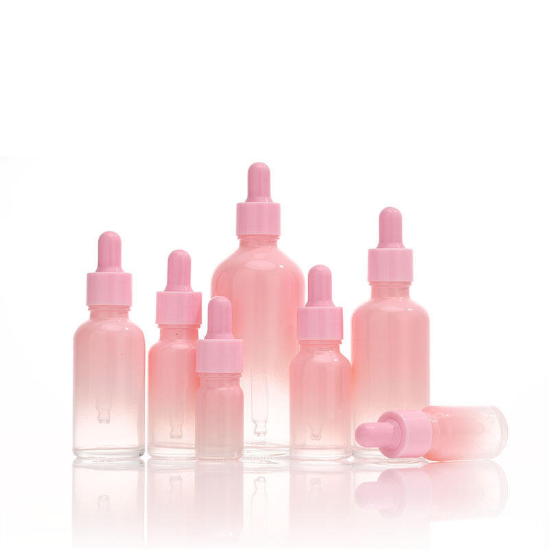 Pink gradient essential oil bottle