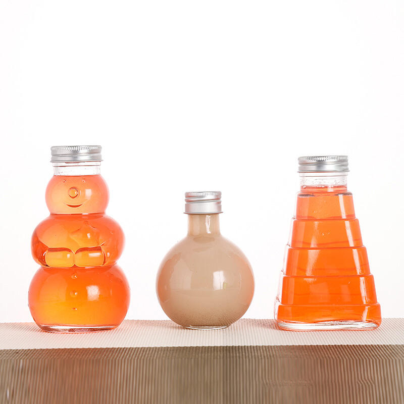 Round glass juice bottle