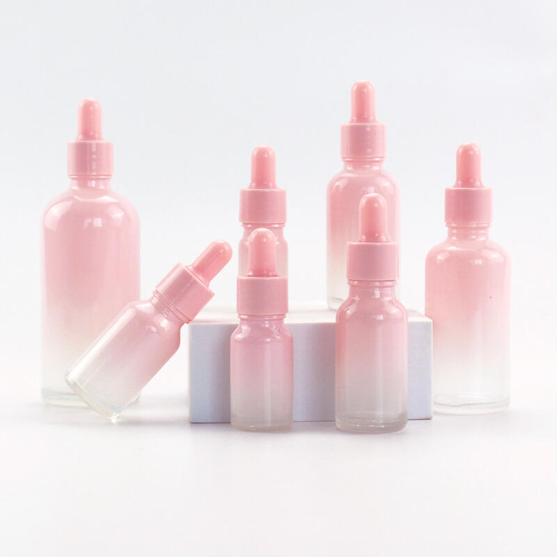 Pink gradient essential oil bottle