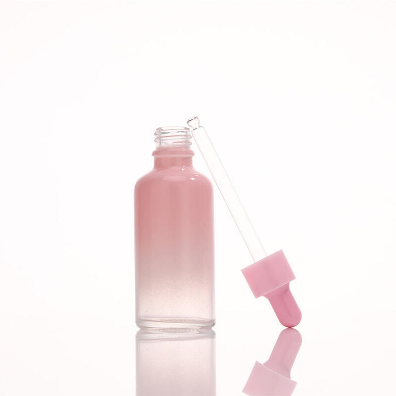 Pink gradient essential oil bottle
