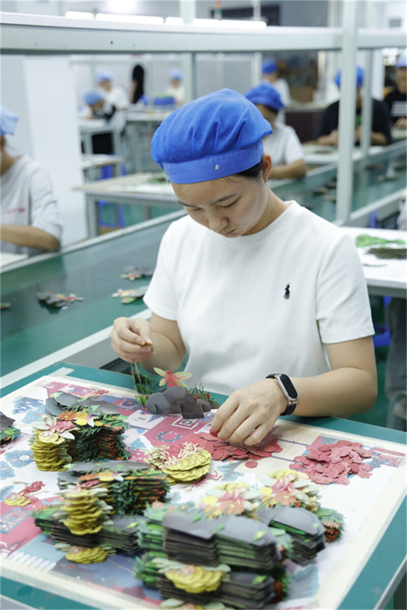 greeting card manufacturing process with laser cutting and handmade assembly.JPG