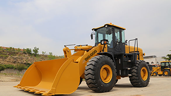 The loader is a good farm tool during the busy season