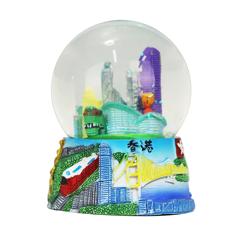 Customized 65mm Hong Kong architectural statue glass snow globe resin crafts home office souvenirs decorative ornaments supplier