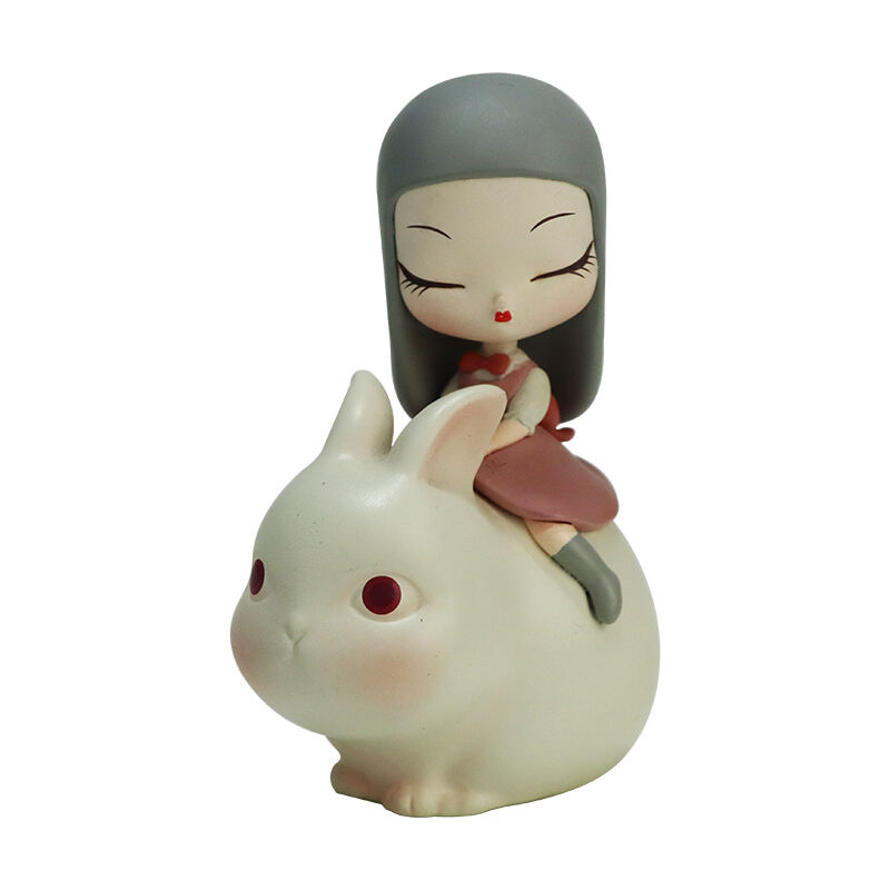 Gyanta lány nyúlon száguldó figura – különleges dísz