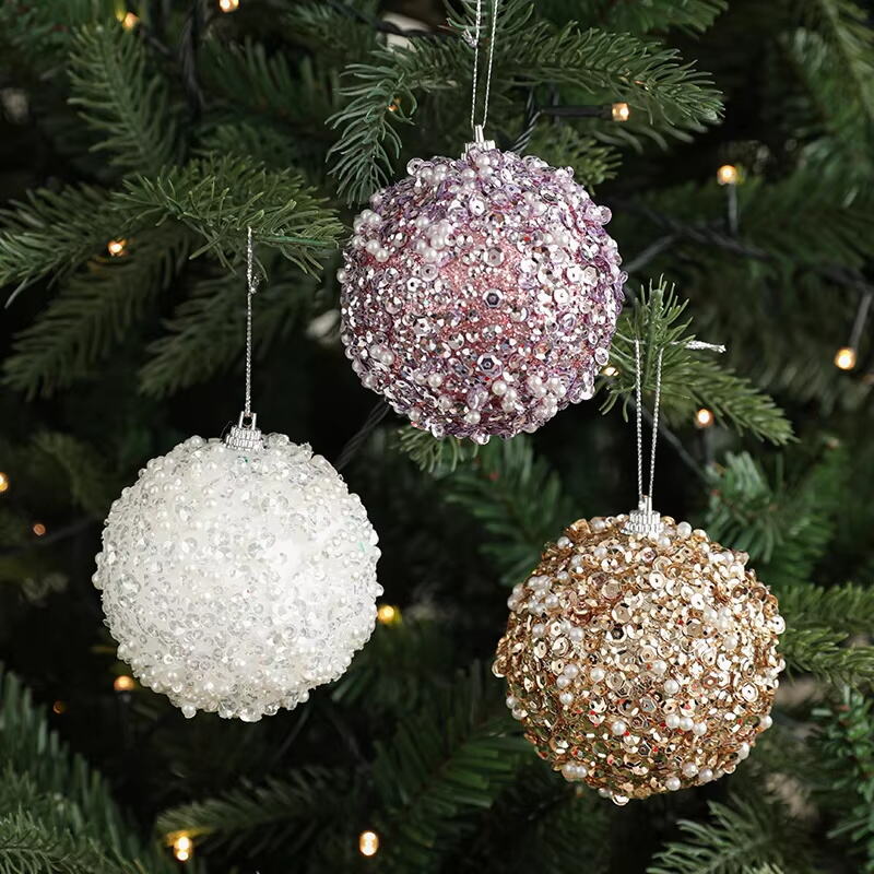 How Do Different Finishes (Matte, Glossy, Glitter) on Christmas Balls Impact the Overall Look?