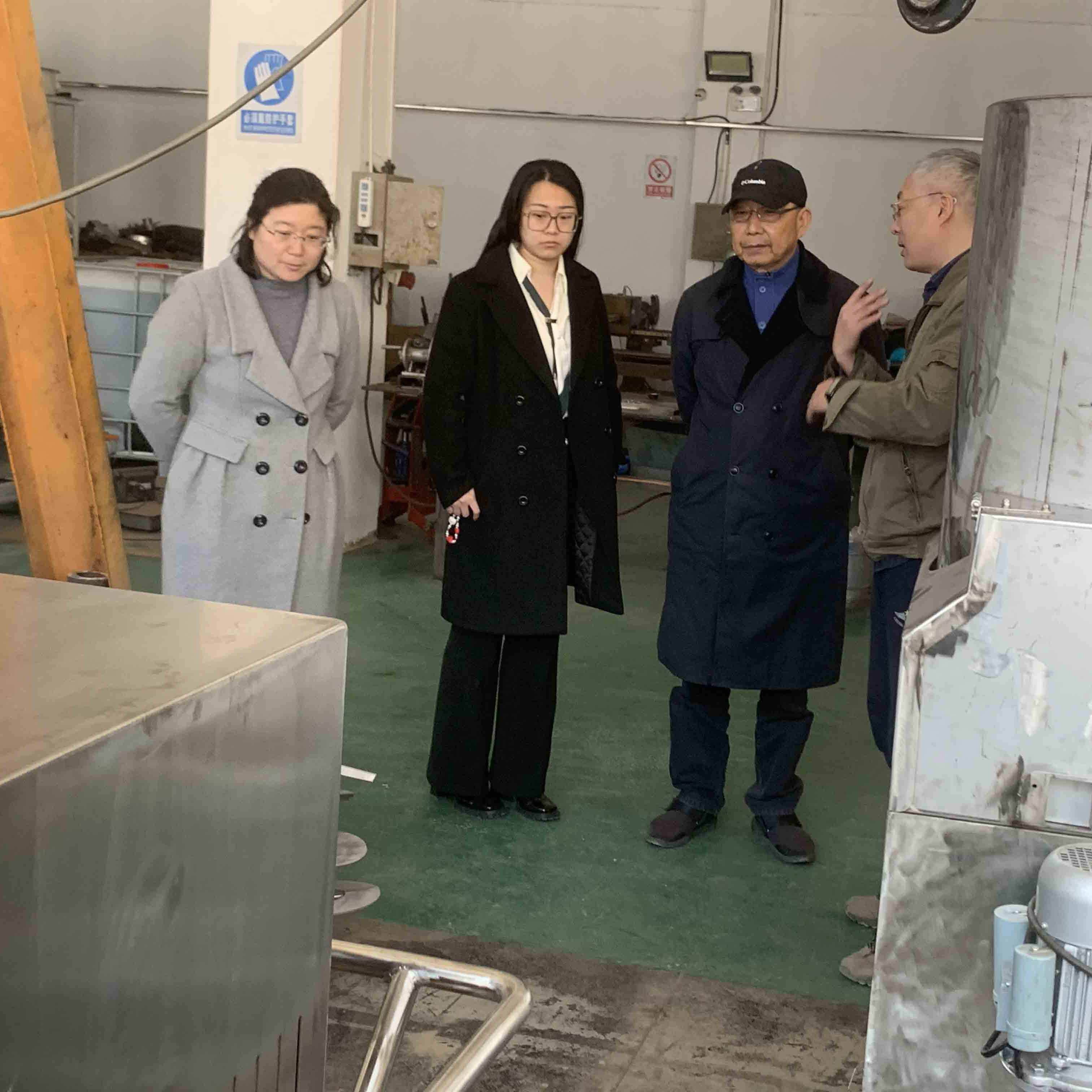 Customers in Taiwan inspect the finished prototype of stainless steel foam concrete machine