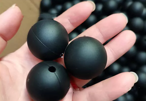 Customized Black hollow rubber ball factory