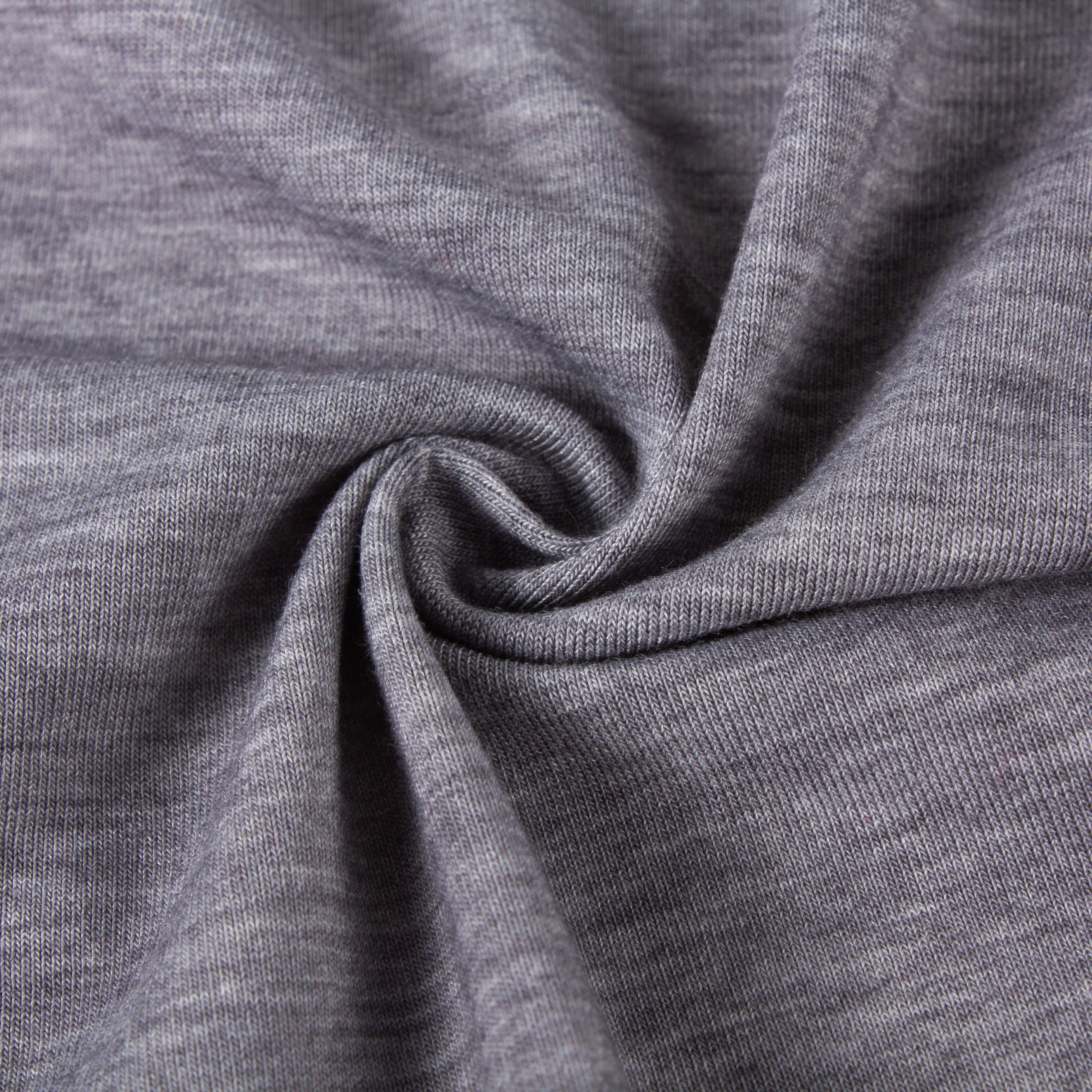 Pourquoi le tissu polyester élasthanne est-il largement utilisé dans les vêtements de sport moulants ?
