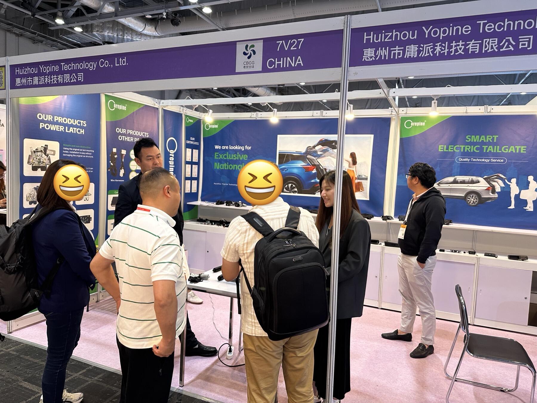 Buyers testing Corepine electric tailgate at 2025 show