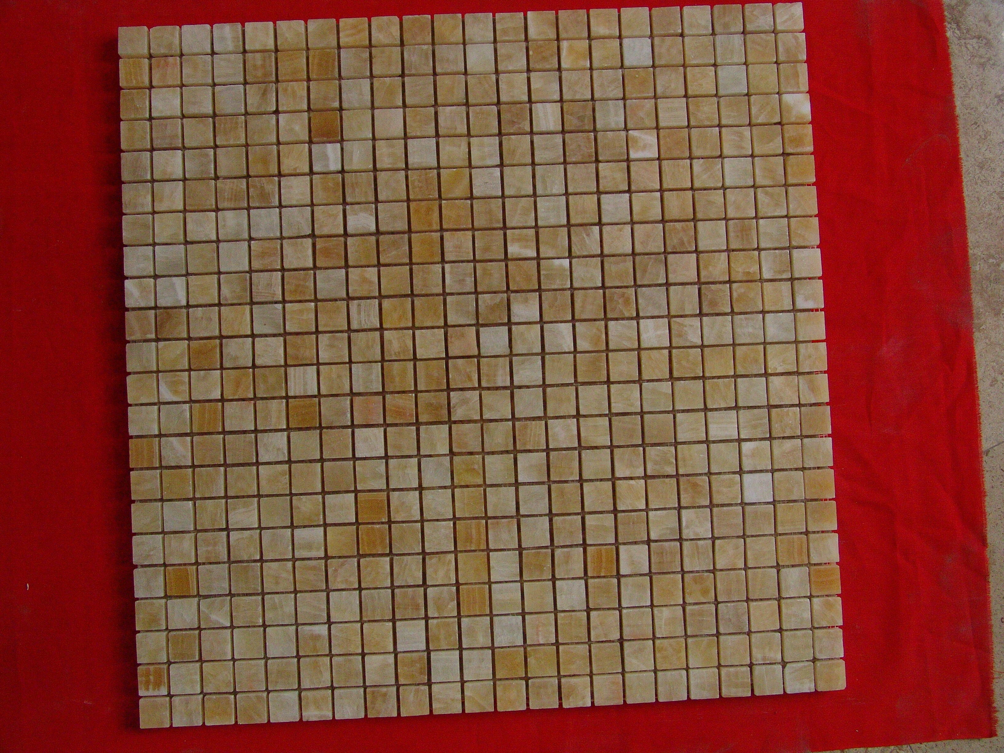 Kunstneriske stenmosaikfliser til skræddersyede indendørsdesign