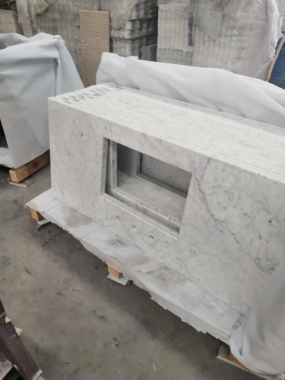 Tidsløs skønhed med Carrara marmorvasketoppe