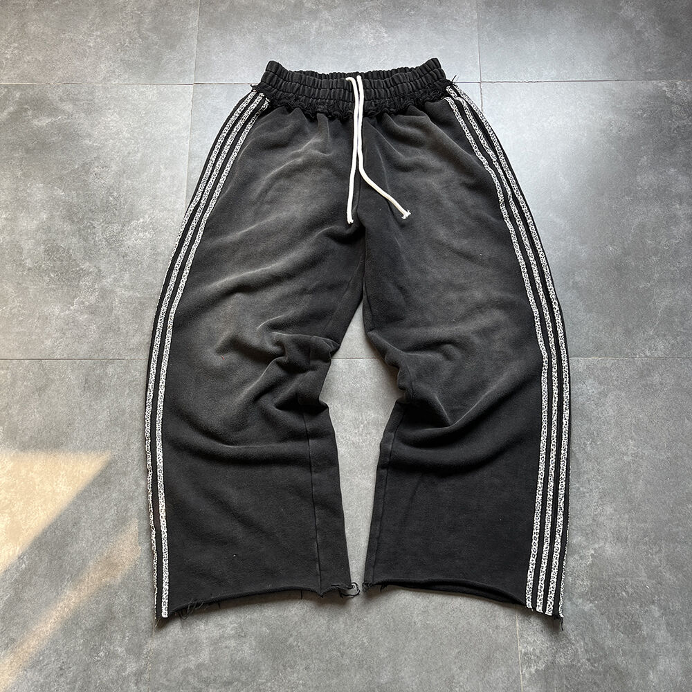 Roba urbana personalitzada per a homes: pantalons de jogger amples i llargs amb franja lateral estampada amb motiu de leopard, 100 % cotó amb acabat àcid, per a homes