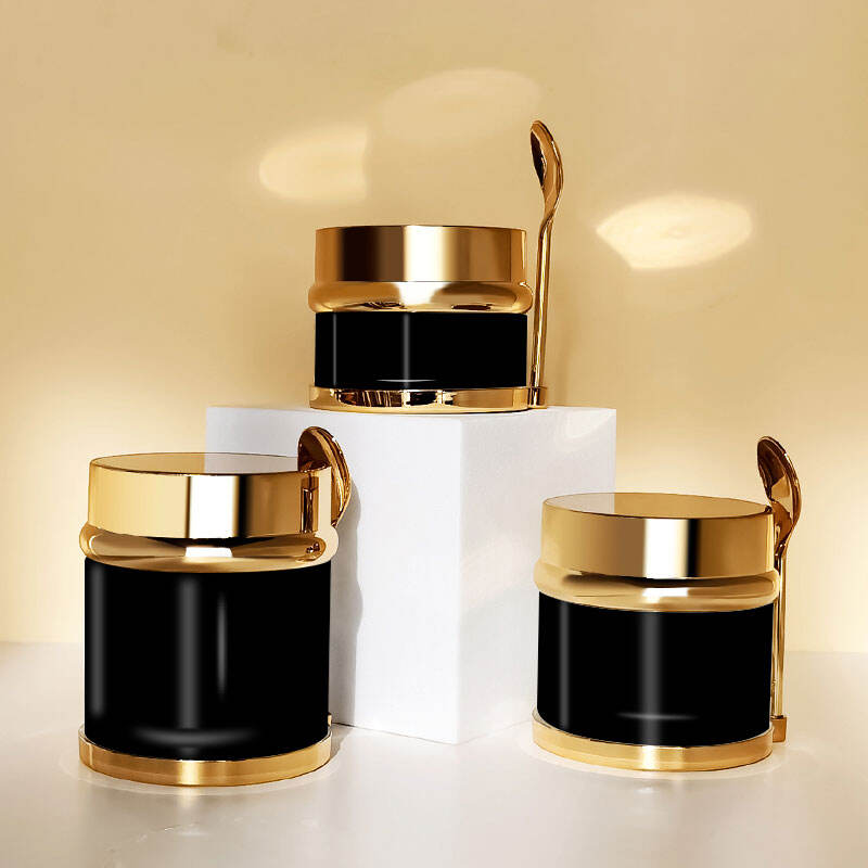 Individuelles Logo öko-freundlicher Luxus Hautpflege-Cremeglasbehälter Kosmetik 20ml 30ml 50ml Schwarze Goldverschluss Glasflasche mit Löffel und Box