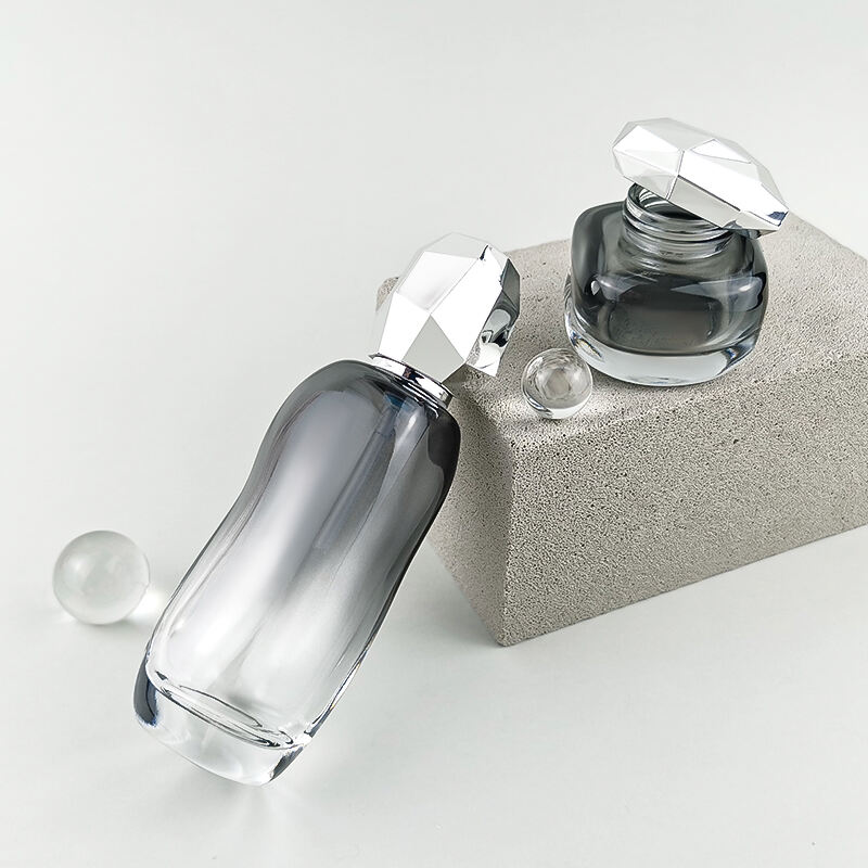 Unregelmäßiges Gradientenschwarzes Kosmetikglasset mit silbernem Verschluss HY-2448