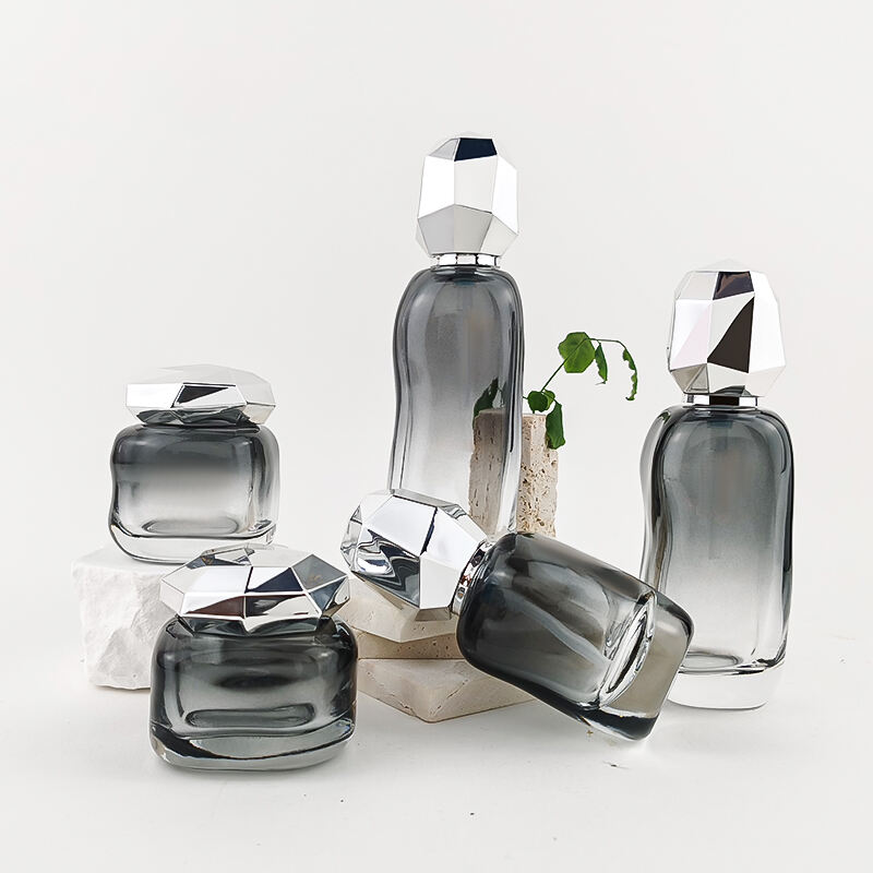 Unregelmäßiges Gradientenschwarzes Kosmetikglasset mit silbernem Verschluss HY-2448