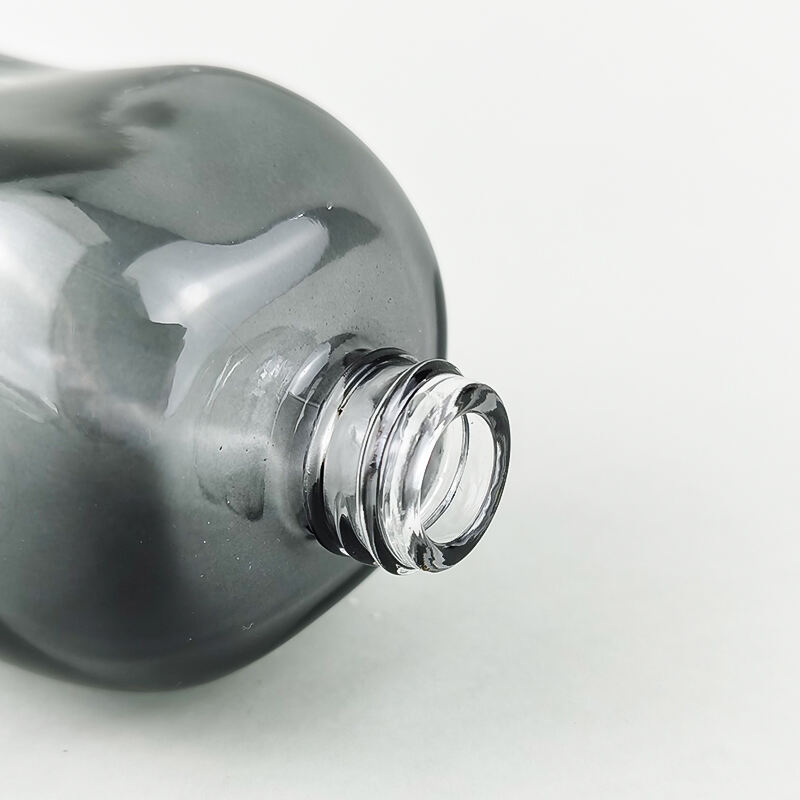 Unregelmäßiges Gradientenschwarzes Kosmetikglasset mit silbernem Verschluss HY-2448