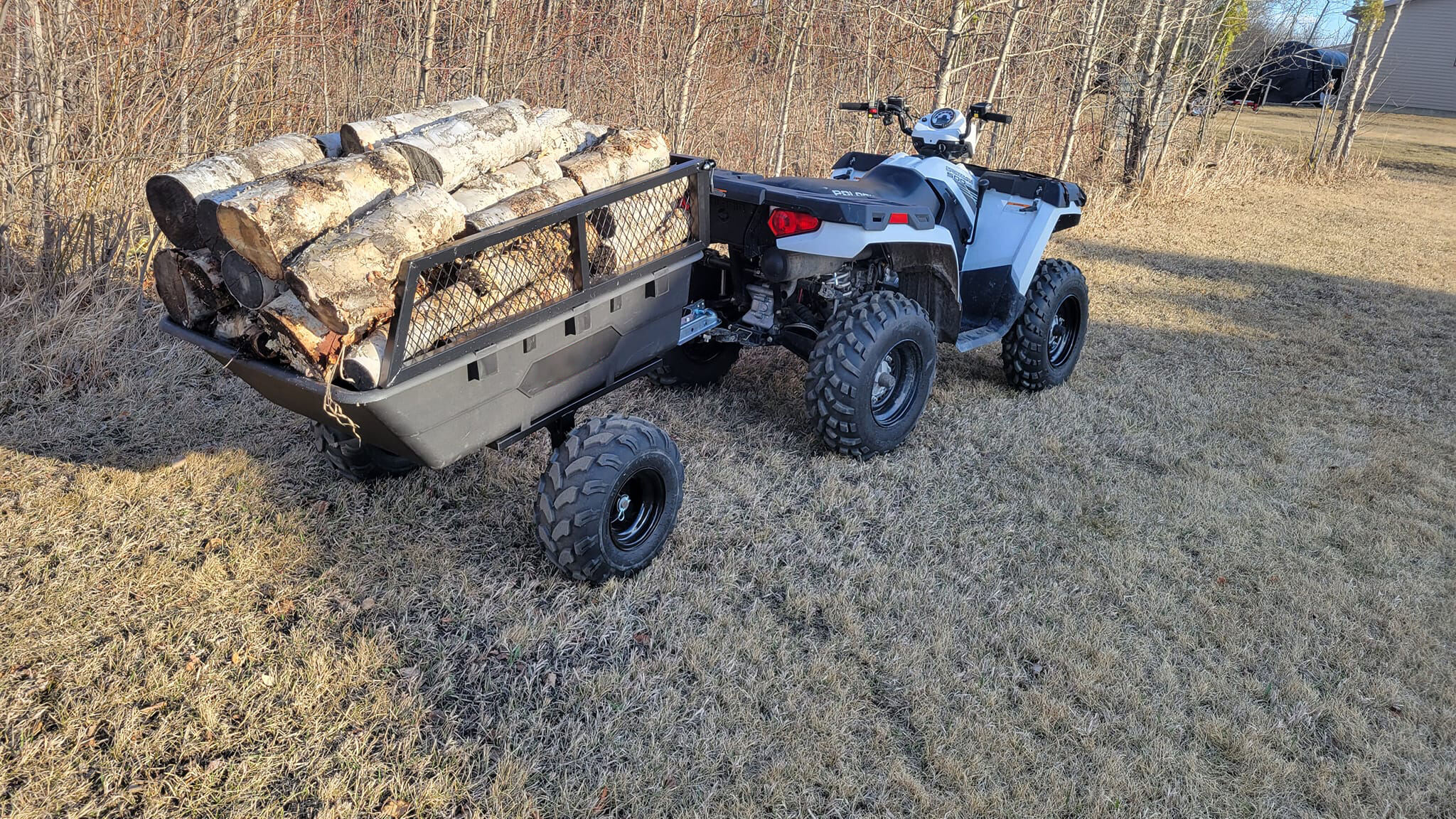 Do wider ATV trailer wheels reduce turf damage on lawns