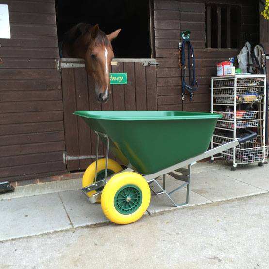 Why is a heavy-duty wheelbarrow vital for construction sites?