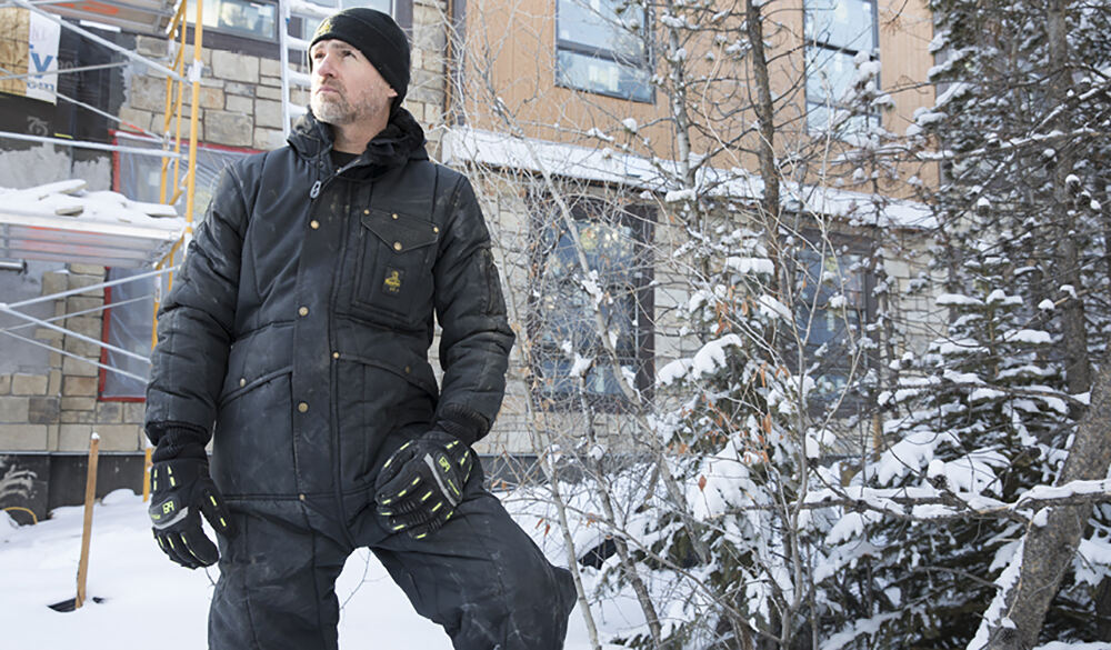 1-freezer-suit-coveralls-man-working-in-snow.jpg
