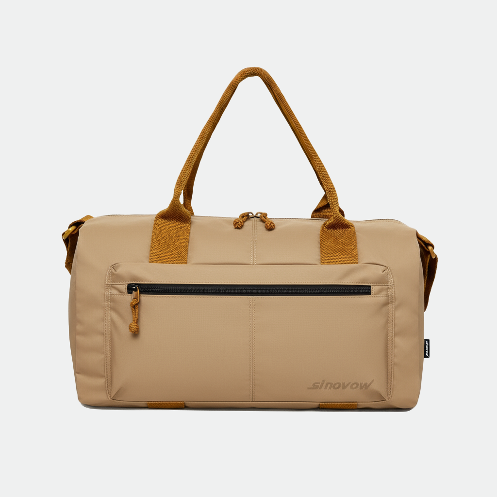 Khakifarbener kompakter Reise-Duffel aus Ripstop-Material mit orangefarbenen Hebegriffen