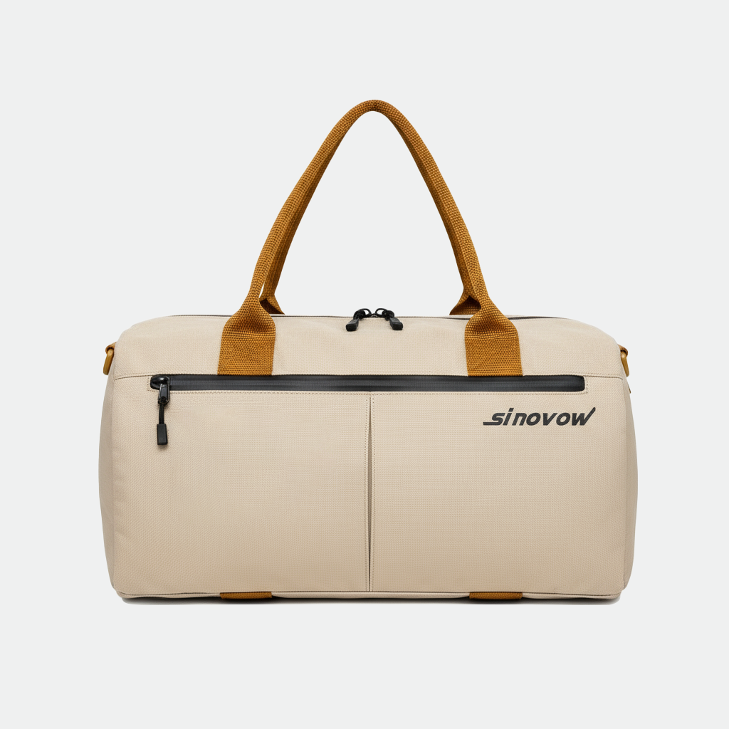 Beige, kompakte Reisetasche aus Ripstop-Material mit orangefarbenen Griffschlaufen