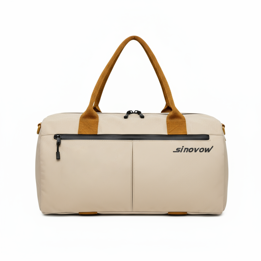Beige, kompakte Reisetasche aus Ripstop-Material mit orangefarbenen Griffschlaufen