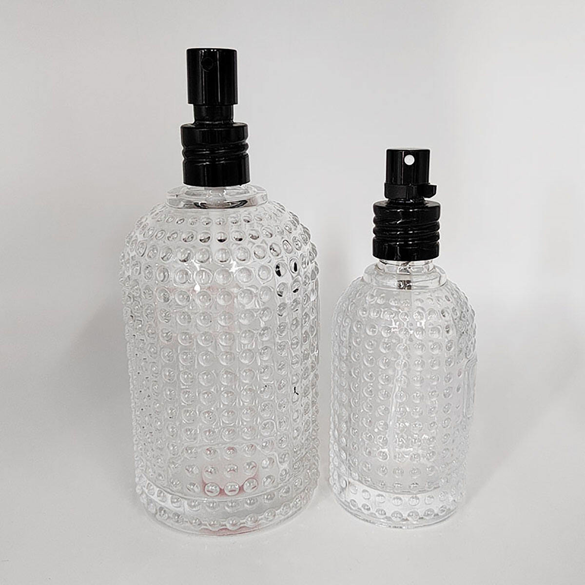 Wholesale Luxury Clear Perfume Bottle Custom Round Perfume Glass Bottle Empty Refillable 50ml 100ml Perfume Bottles