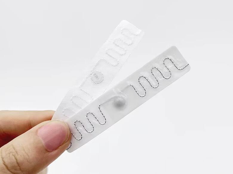 9 smart chip label rfid flexible textile laundry tags custom-4
