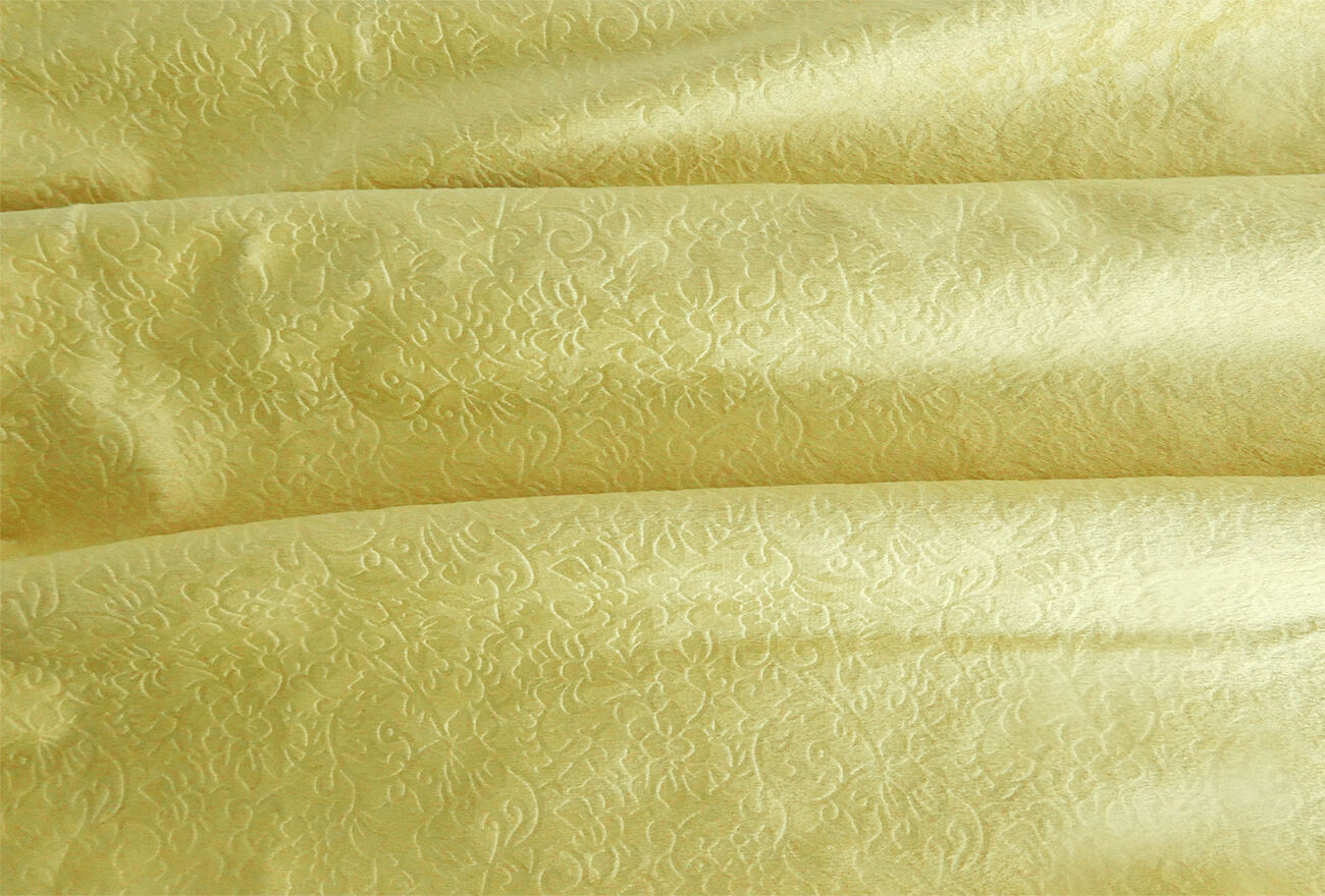 Embossed cushion cover manufacture