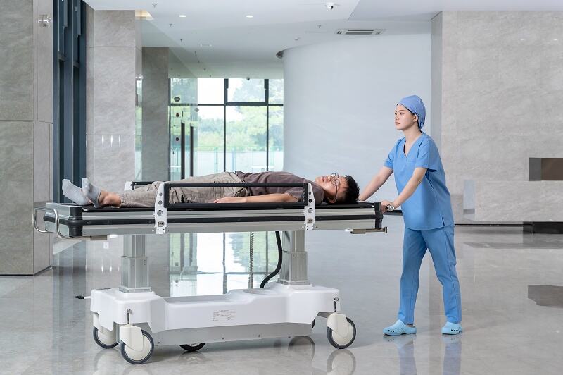 Electric medical <a class='inkey' style='color:blue' href='https://www.vudvt.com/medical-transfer-patient-bed' target='_blank'>Transfer bed</a>.jpg