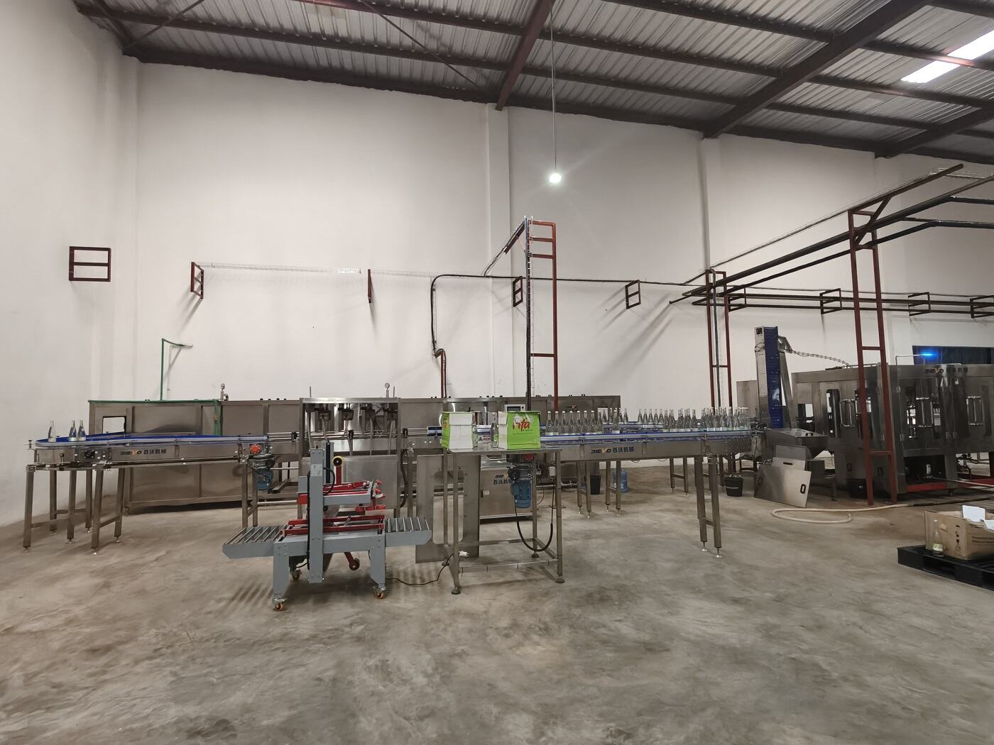 2000bph carbonated beverage filling production line for glass bottle in Benin