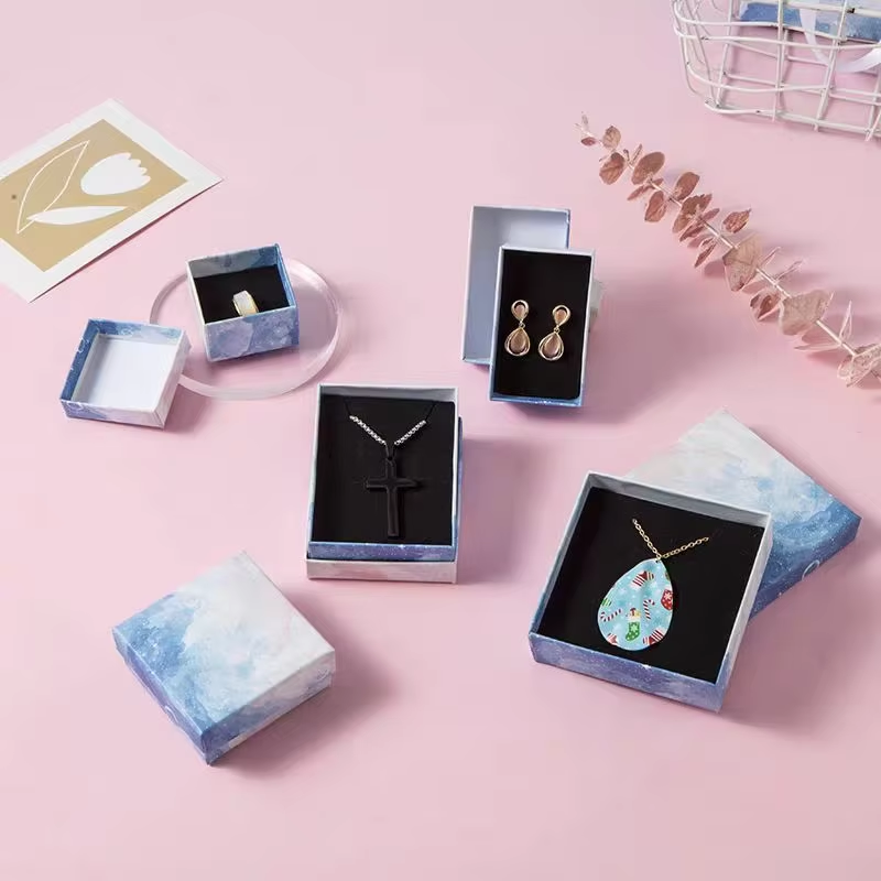Que combinación de cores convén ao deseño da caixa de perfume?