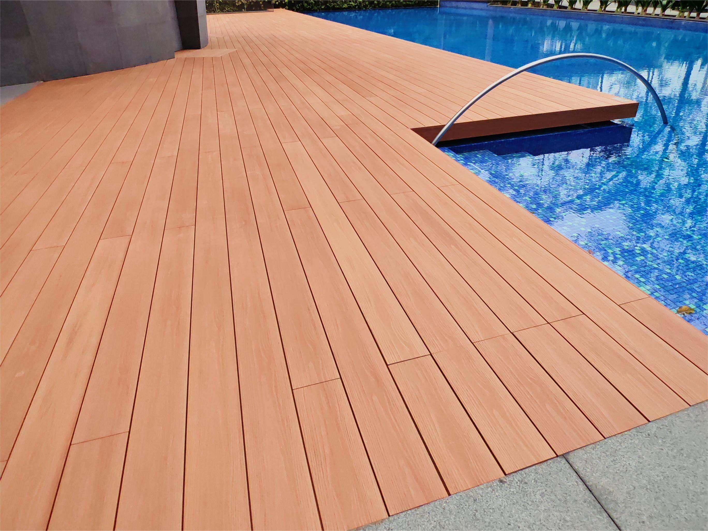 ASA decking at Singapore swimming pool after 12 months exposure - minimal wear, vibrant color retention