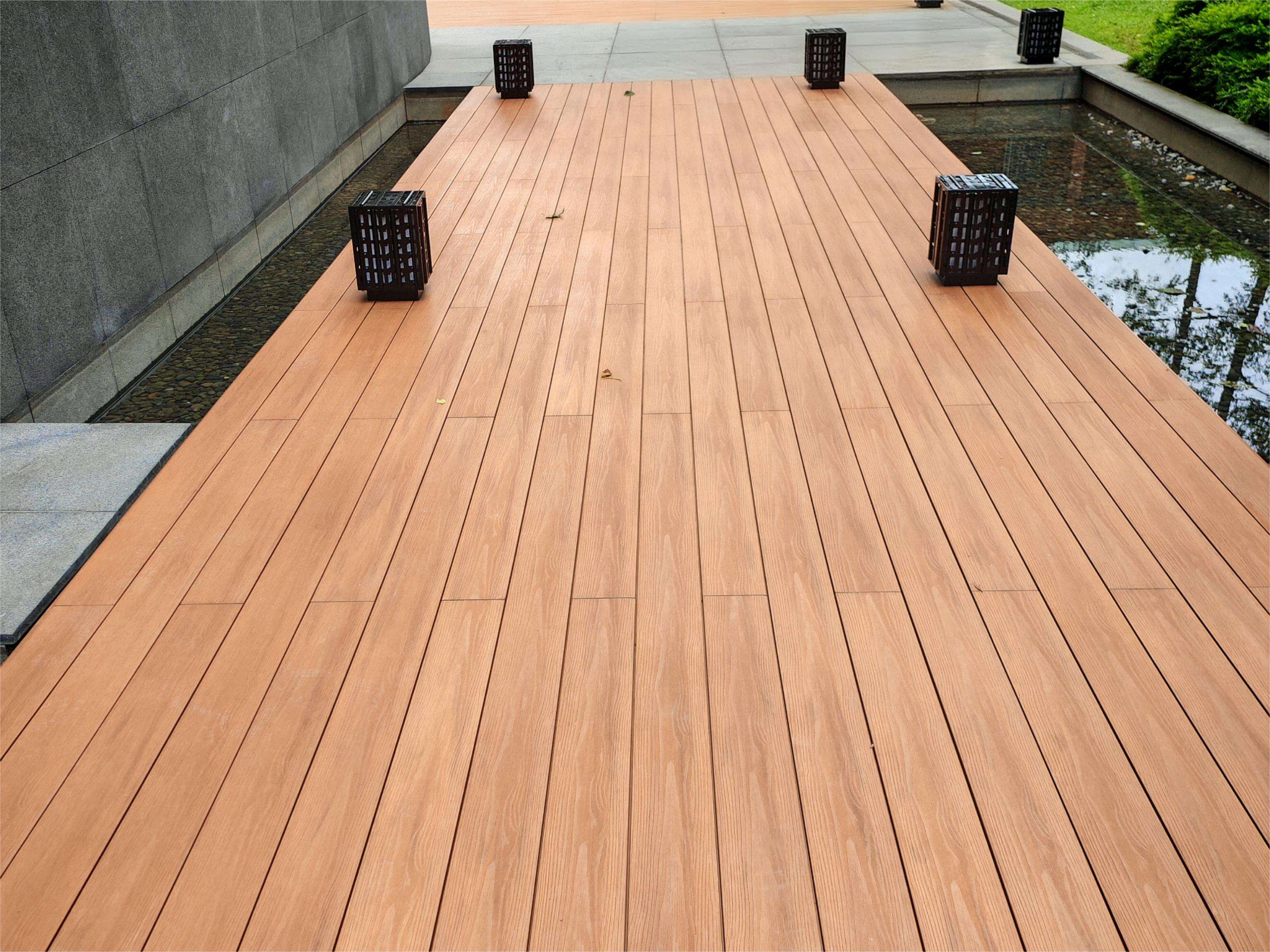 Swimming Pool’s ASA decking after 365 days of tropical sun, chlorine exposure, and monsoons. Cleaned with water-only in 15 minutes.