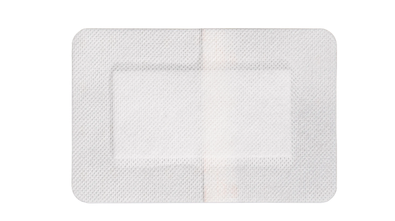 Self-adhesive wound dressing