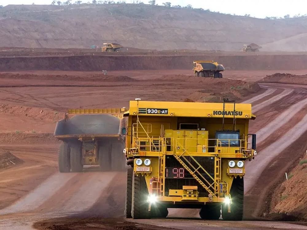 Carajás iron ore mine Komatsu and Caterpillar haul trucks fleet transporting ore in Vale.jpg