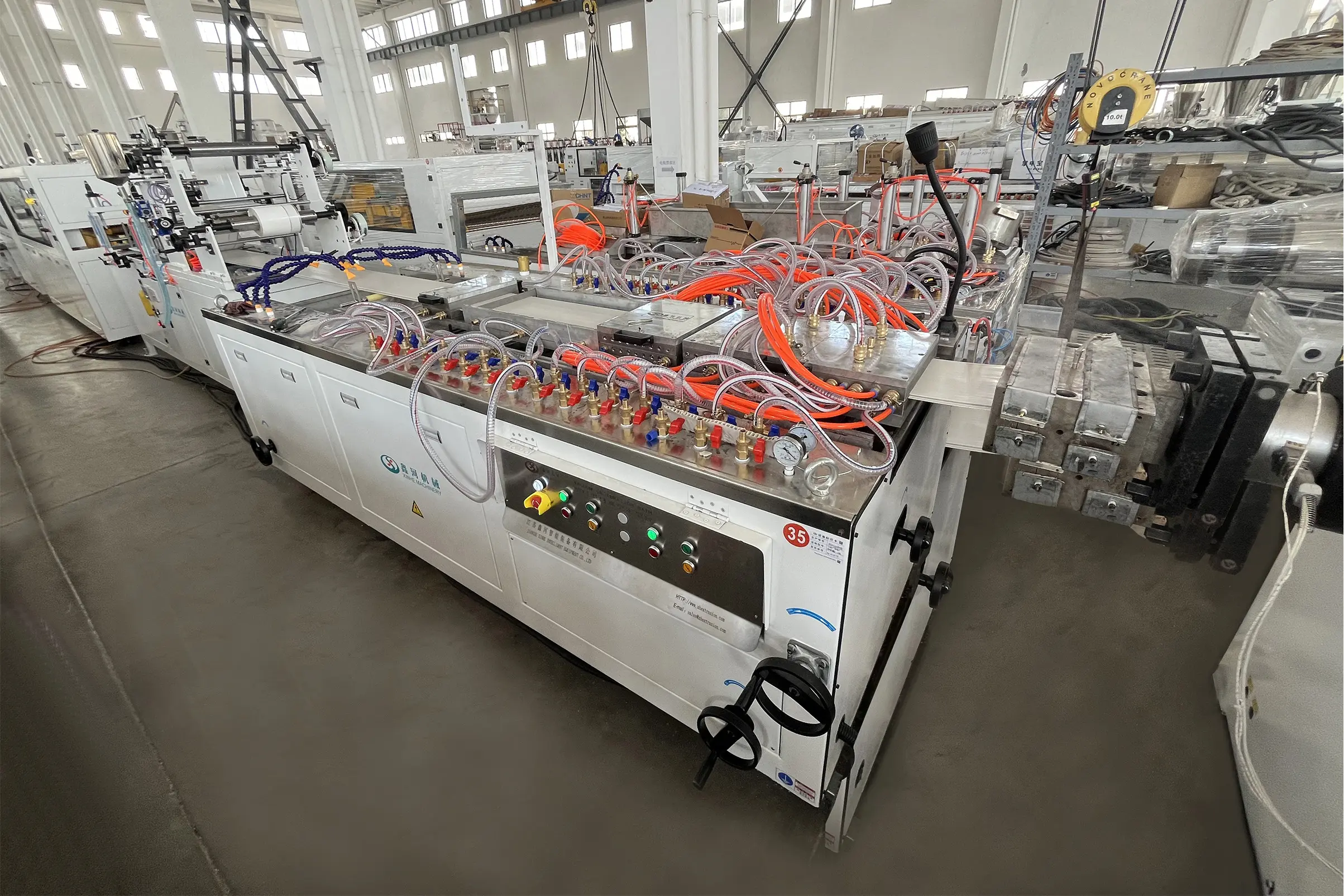 The difference between 200mm wide ceiling production line and 600mm wide ceiling production line