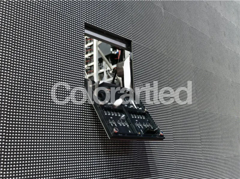 A close-up view of a magnetic front maintenance LED display module, highlighting the quick-release mechanism for easy servicing without rear access.