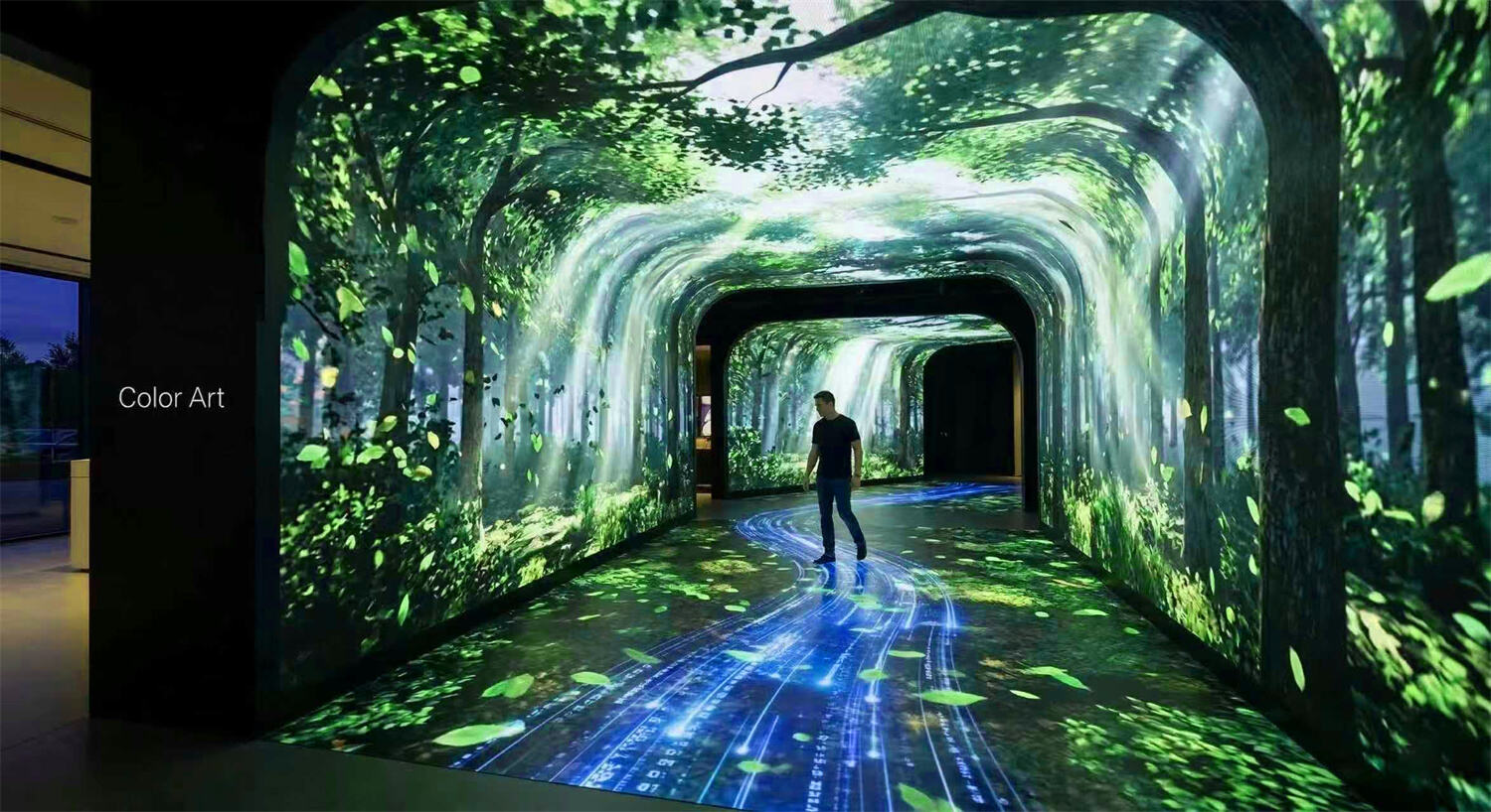 An S-shaped immersive LED tunnel showroom with Color Art seamless COB floor and wall panels.jpg