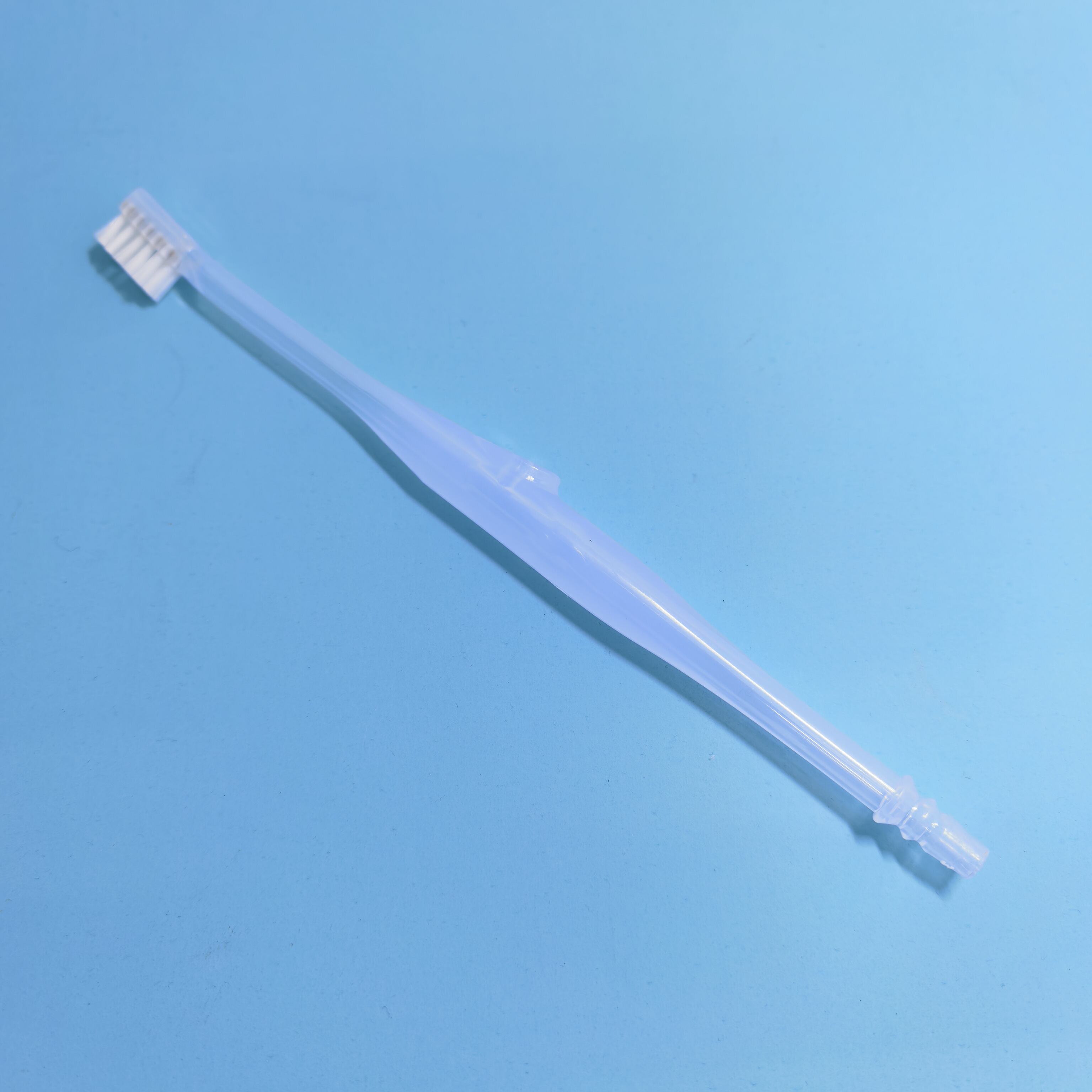 Disposable suction toothbrush