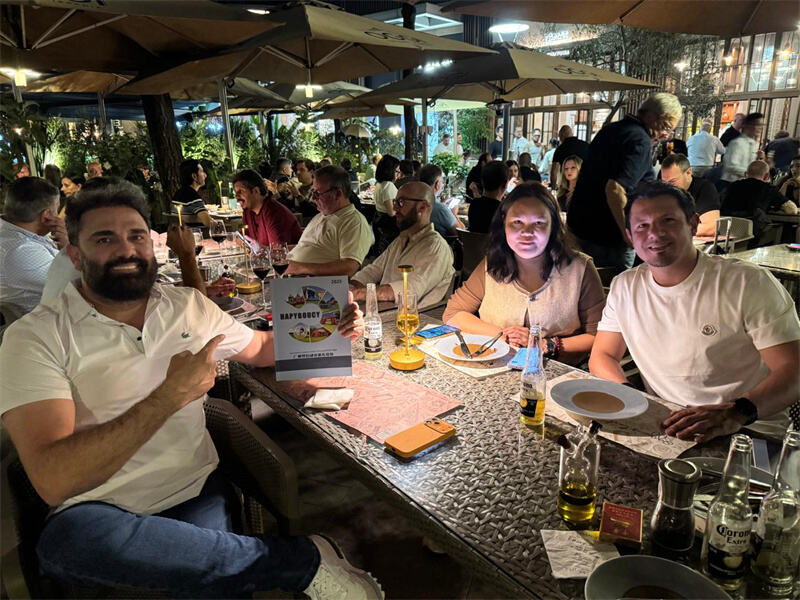 3)Meeting Brazil clients at Italian OGGI Restaurant in Guangzhou to know more about Inflatable bubble house games.