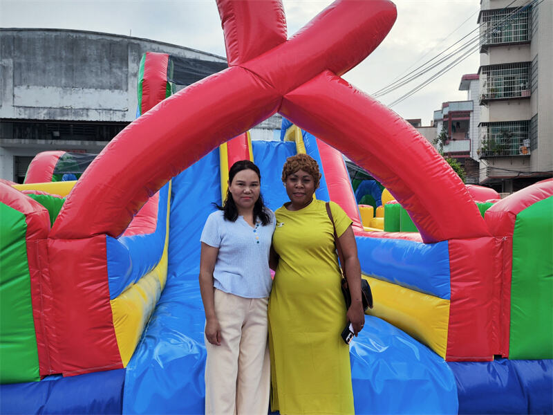 So Nice to meet Bacelo from Congo in our Guangzhou factory to order Inflatable castle and paid in Cash