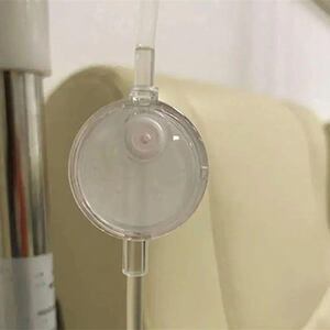 What's that flat circular thing on the IV tube?