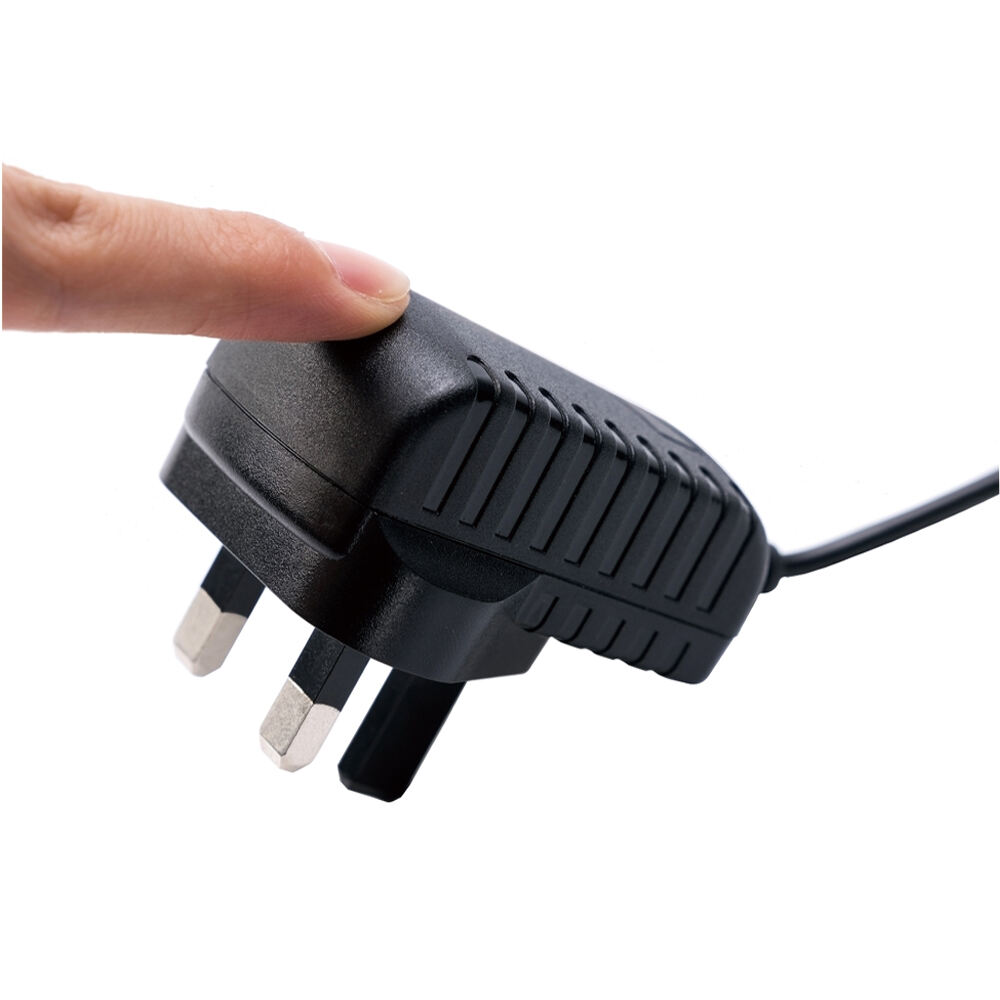 UK Plug 5V 2.4A Wall-mounted Power Adapter