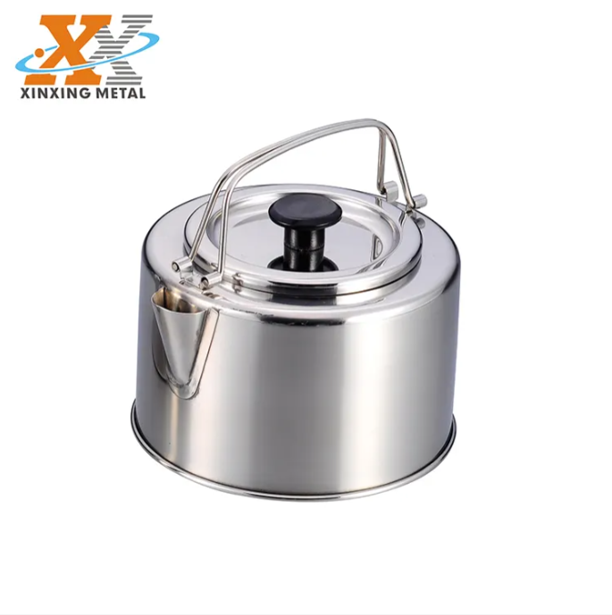 Hvordan kan en kokekjele for camping forbedre effektiviteten ved matlaging i grupper ute i naturen?